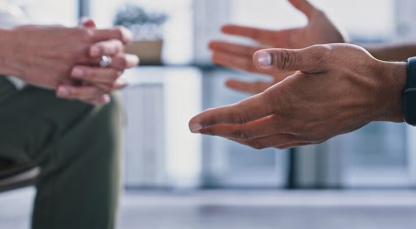 people's hands as they are speaking