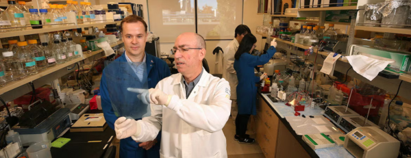 Jeff Perry, Ernest Martinez and students in the lab